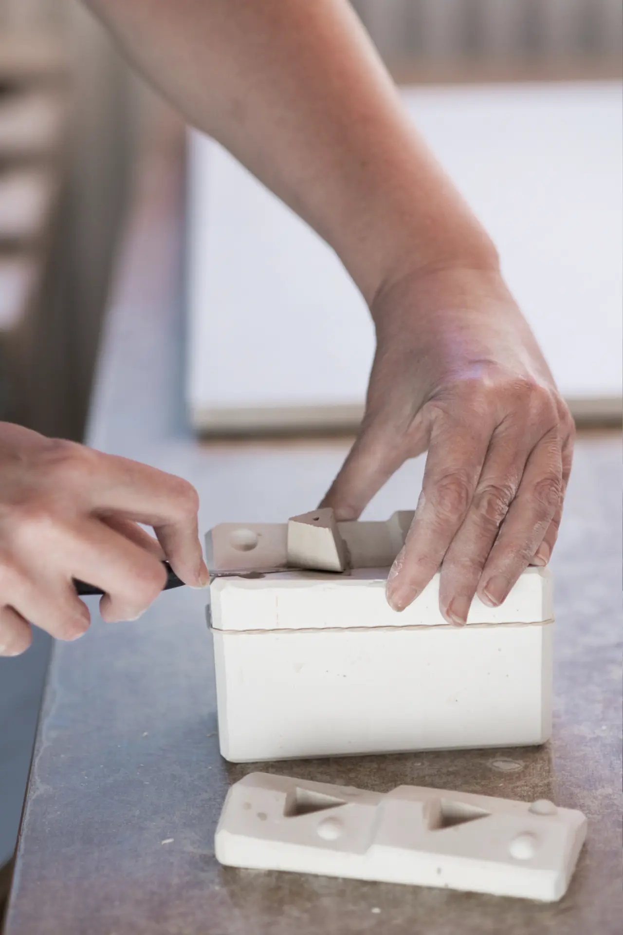 Pouring into plaster molds Pouring into plaster molds